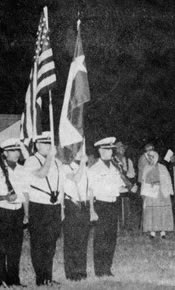 A color guard from the Fredericksburg High School Naval Junior ROTC program displays “Old Glory” as well as the Texas flag during a portion of the Easter Fires Pageant.
